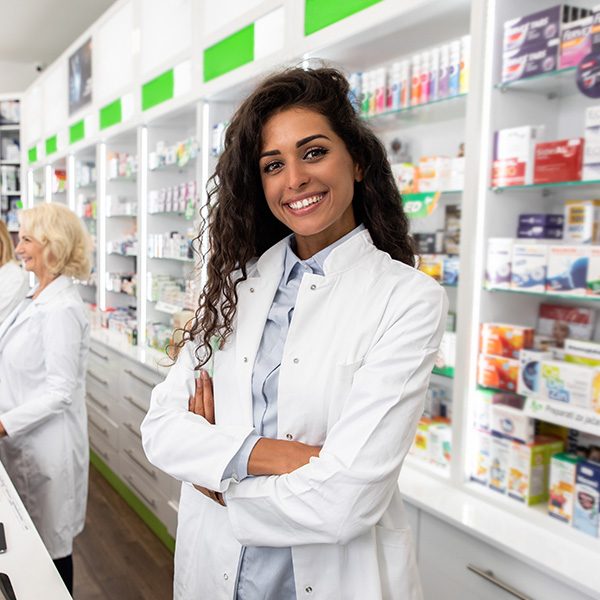 Smiling-Female-Pharmacist-Dark-Hair